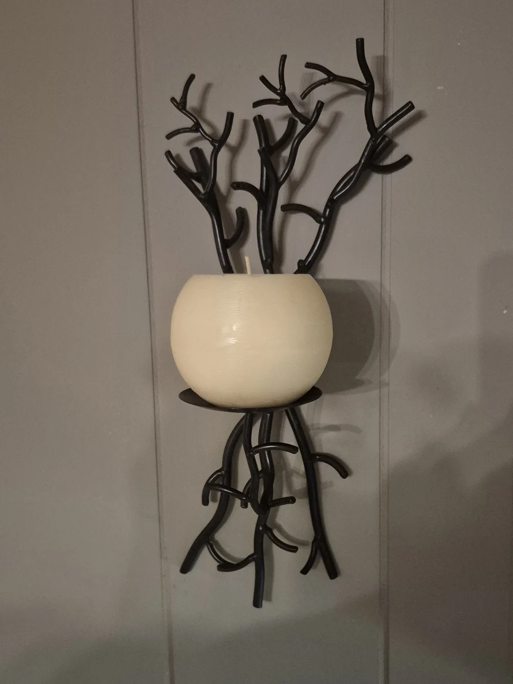 Wall-Mounted Brown Metal Branch Sconce with Cream Candle Holder. Its 17